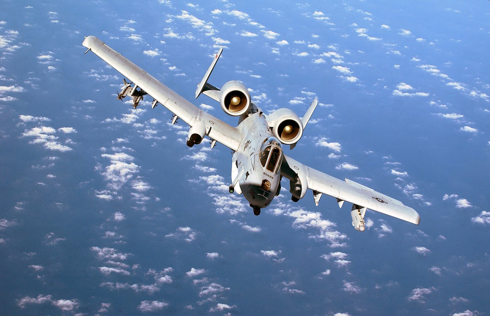 An A-10 Thunderbolt II from the 104th Fighter Wing, Barnes Municipal Airport, Westfield Mass., Massachusetts Air National Guard, banks while flying accross the Mediterranean Sea enroute to a forward operating base.