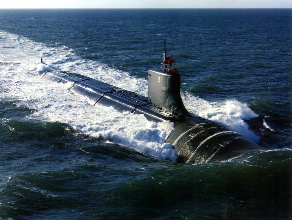 The nation's newest and most advanced attack submarine Seawolf (SSN 21) puts to sea in the Narragansett Bay operating area for her first at-sea trial operations on July 3, 1996. Sea trials include various tests of the Seawolf propulsion systems and the first underway submergence of the submarine