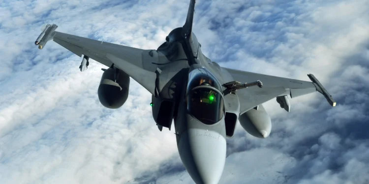 A Swedish Air Force JAS 39 Gripen multirole fighter jet during military exercises.