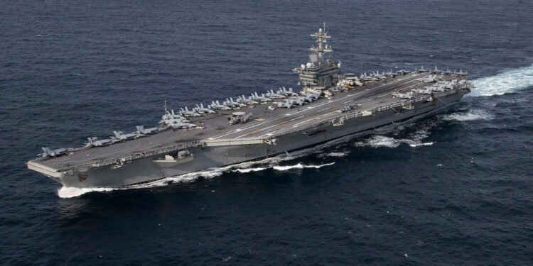 The U.S. Navy aircraft carrier USS Abraham Lincoln (CVN-72) underway in the Atlantic Ocean during a strait transit exercise