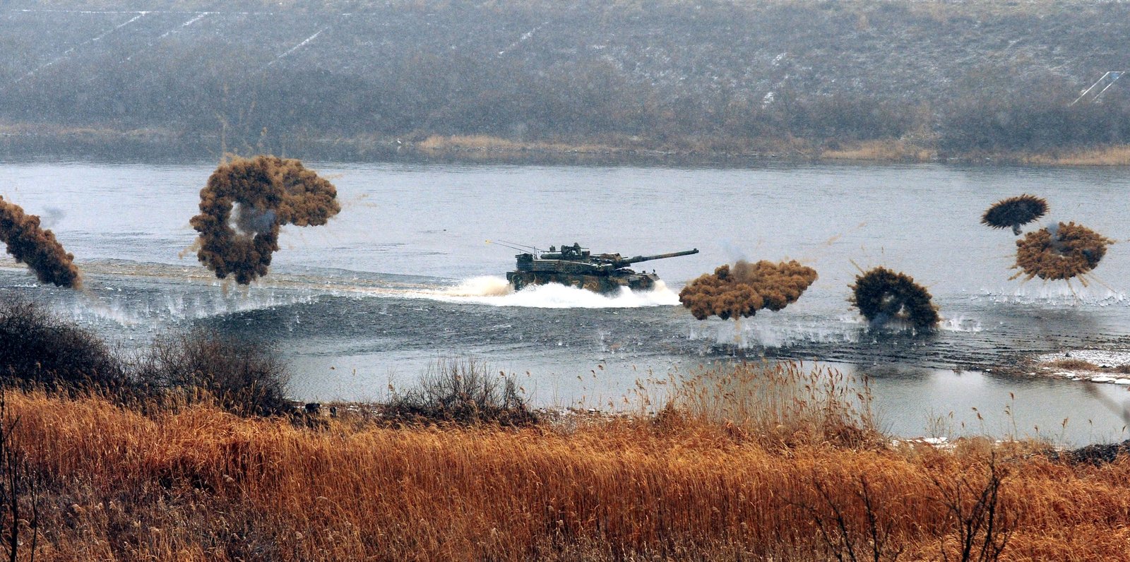 South Korean K2 Black Panther main battle tank demonstrating off-road capability in mountainous environment.