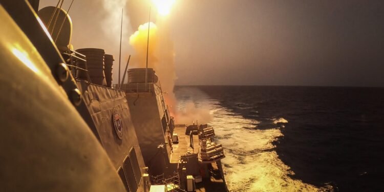 U.S. Navy Arleigh Burke-class guided-missile destroyer USS Carney Firing SM-6 Interceptor