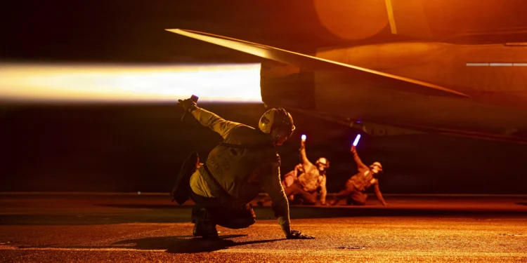 U.S. Sailors conduct flight operations aboard Nimitz-class aircraft carrier USS George H.W. Bush (CVN 77)