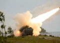M142 High Mobility Artillery Rocket System (HIMARS) fires a training rocket during a live-fire exercise in Undva, Estonia, July 11, 2025. The exercise included dry-firing, equipment staging, communication systems checks, and concluded with live-fire qualifications.