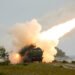 M142 High Mobility Artillery Rocket System (HIMARS) fires a training rocket during a live-fire exercise in Undva, Estonia, July 11, 2025. The exercise included dry-firing, equipment staging, communication systems checks, and concluded with live-fire qualifications.