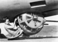 Cutaway diagram or close-up profile of a B-17 ball turret showing the fetal position of the gunner.