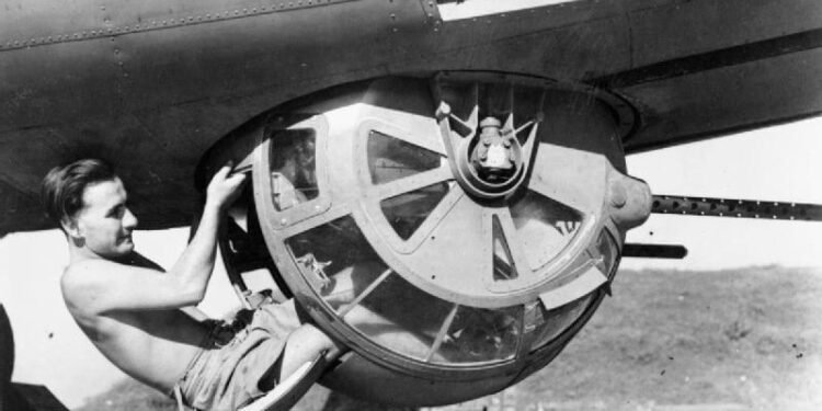 Cutaway diagram or close-up profile of a B-17 ball turret showing the fetal position of the gunner.