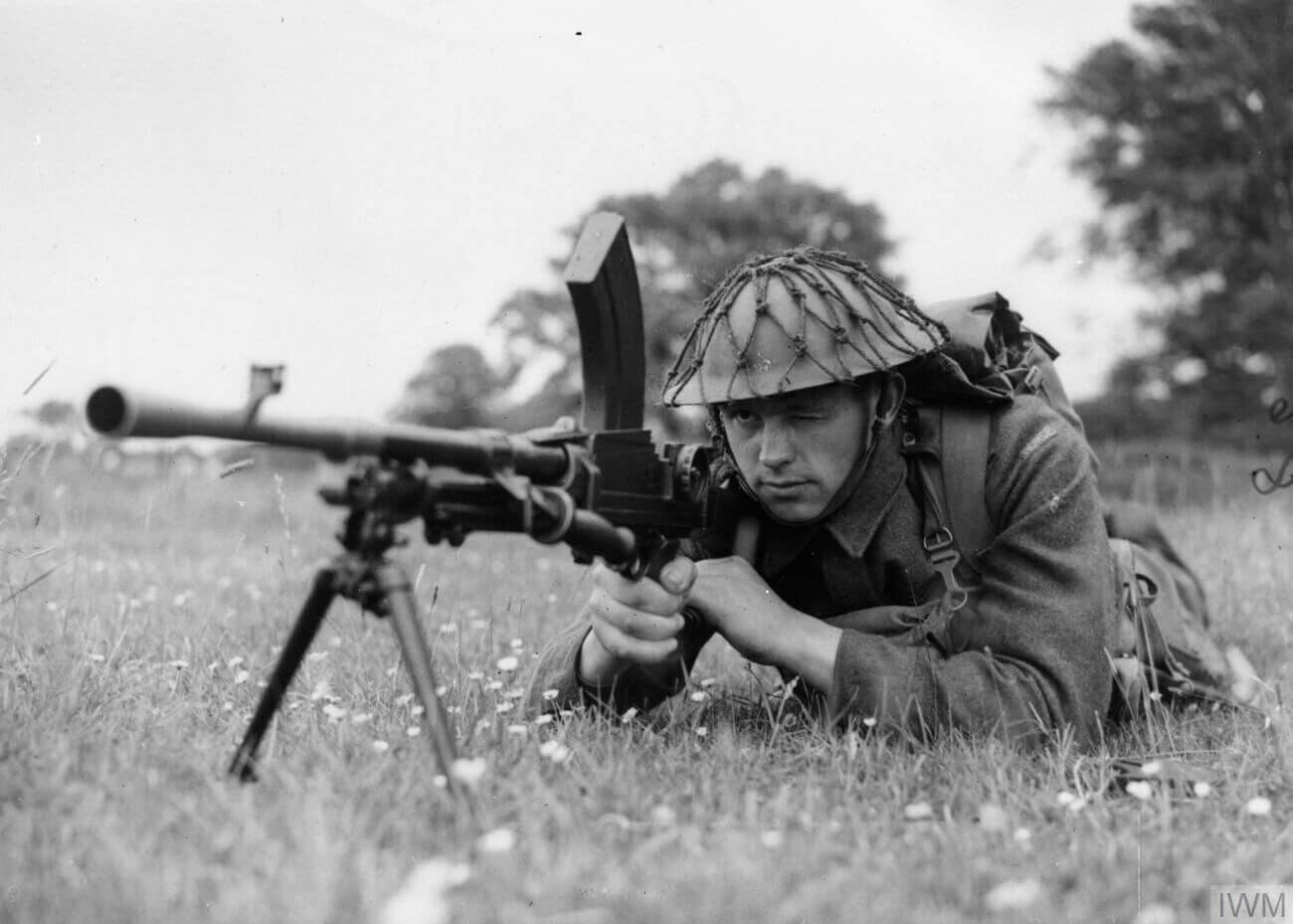 A Bren gunner of the Norwegian Brigade takes aim during training at Dumfries, Scotland, 27 June 1941.