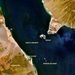 Satellite view of the Bab el-Mandeb Strait highlighting the strategic positioning of Perim and Hanish islands.