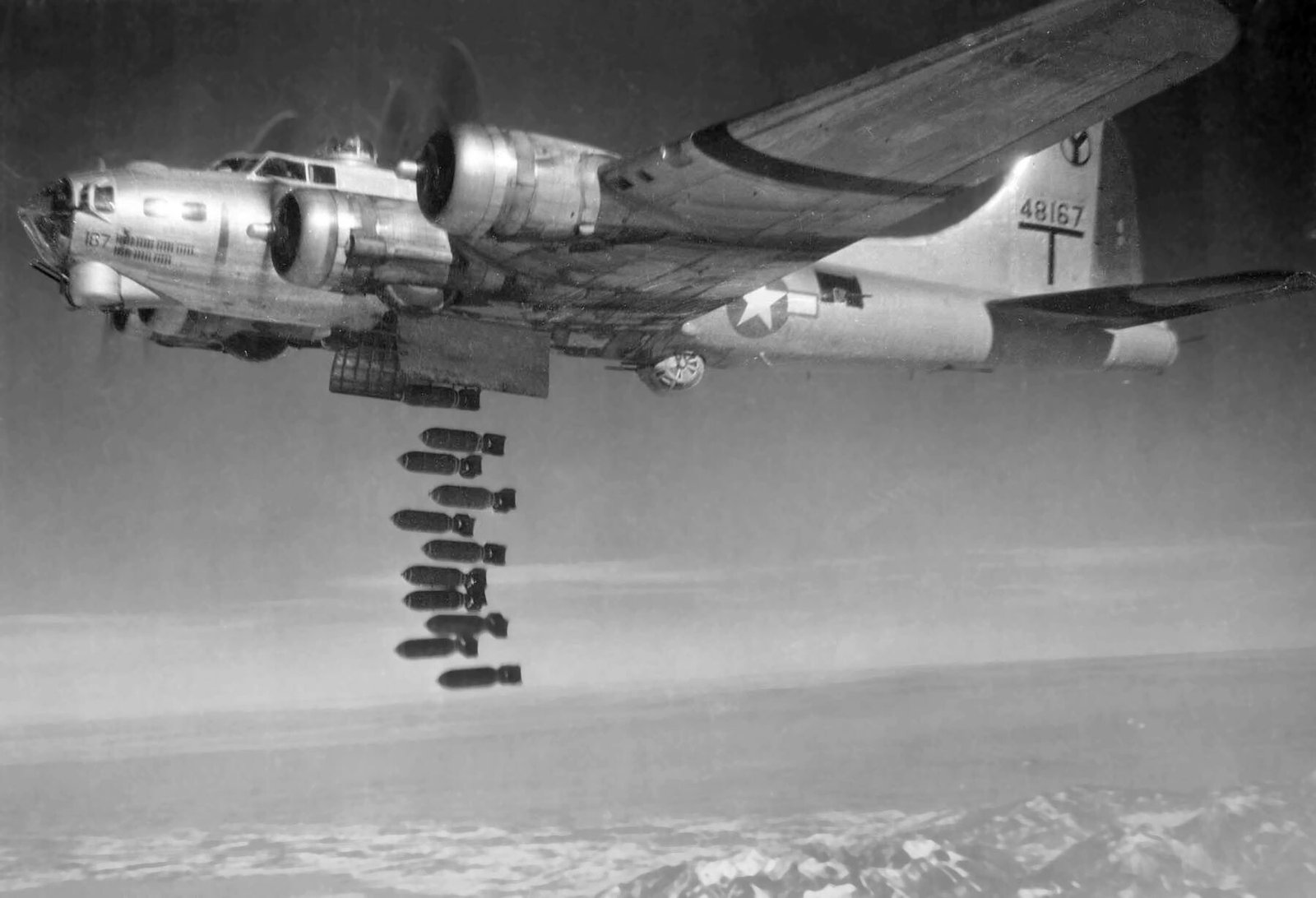A U.S. Army Air Force Boeing B-17G-50-VE Flying Fortress (s/n 44-8167, built by Lockheed) of the 15th Air Force, 2nd Bomb Group, 96th Bomb Squadron, dropping its bombs in 1944/45. The 2nd BG was based at Amendola, Italy, from 9 December 1943 to 19 November 1945.