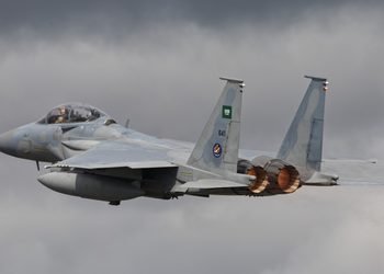 An advanced RSAF F-15SA Strike Eagle fighter jet equipped with precision-guided munitions