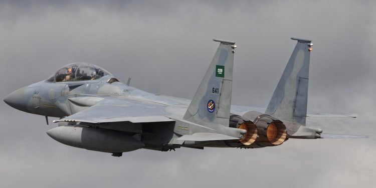 An advanced RSAF F-15SA Strike Eagle fighter jet equipped with precision-guided munitions
