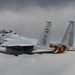 An advanced RSAF F-15SA Strike Eagle fighter jet equipped with precision-guided munitions