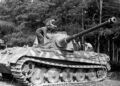 Panzerkampfwagen VI Ausf. B King Tiger tank with Henschel turret in a field.