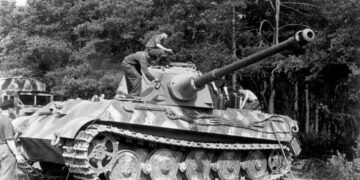 Panzerkampfwagen VI Ausf. B King Tiger tank with Henschel turret in a field.