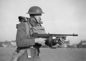 A British soldier equipped with a Thompson M1928 submachine gun in November 1940