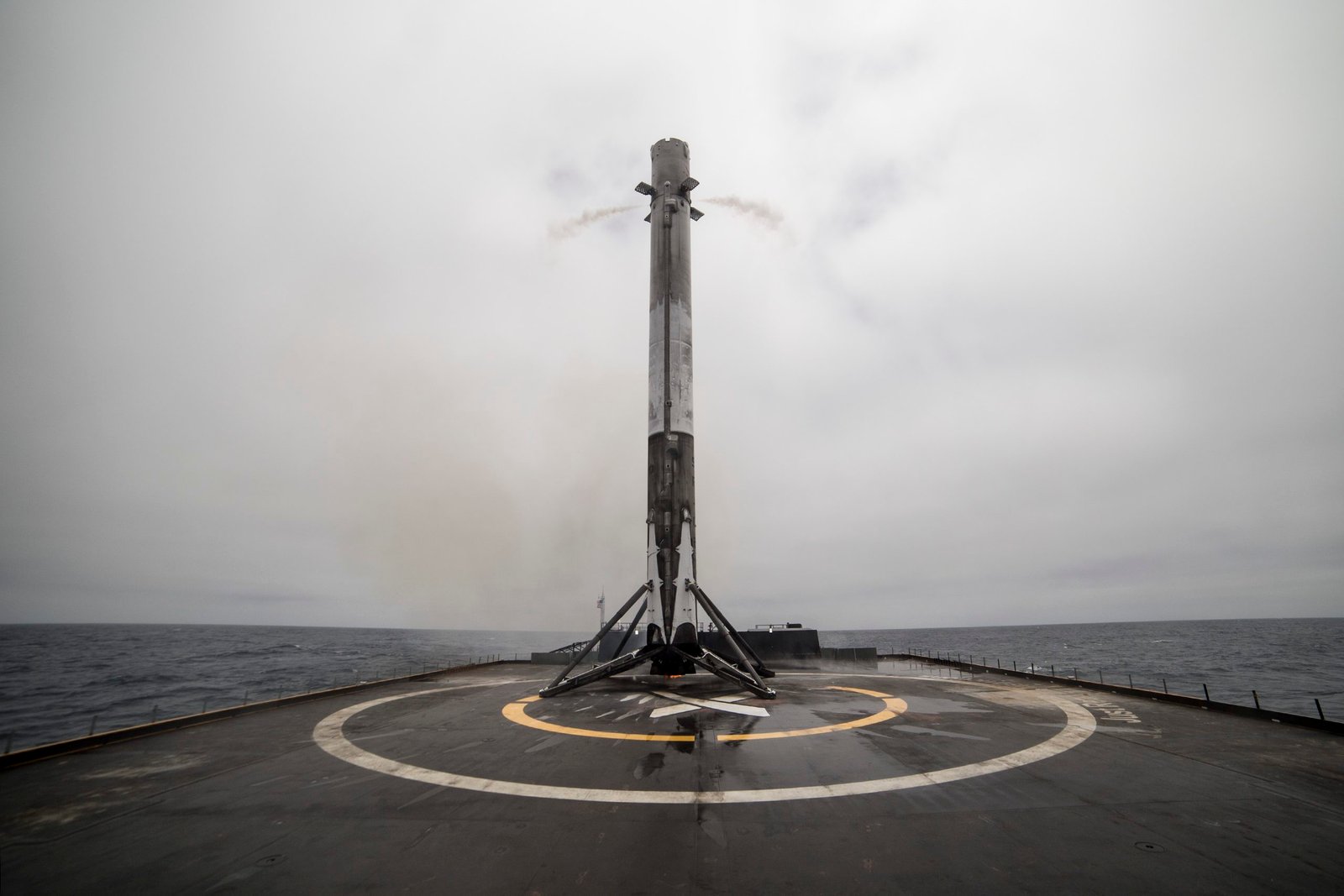SpaceX Falcon 9 first stage booster successfully touching down on an autonomous spaceport drone ship at sea.