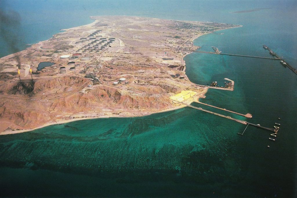 Satellite and maritime view of Kharg Island Oil Terminal, highlighting the scale of the vulnerable infrastructure.