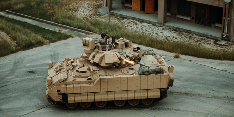 A U.S. Army M2A4 Bradley infantry fighting vehicle maneuvering during testing exercises.
