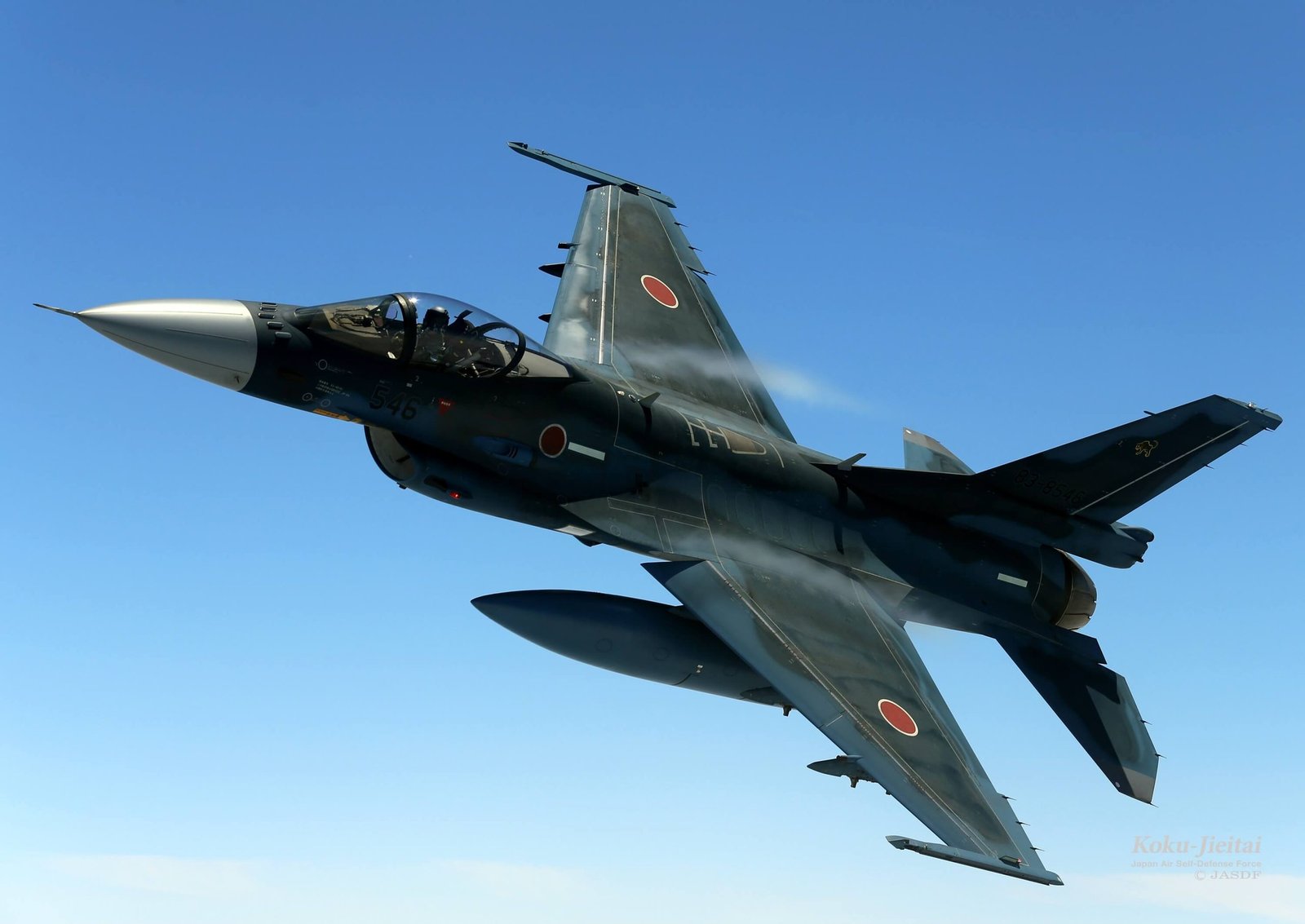 A Japanese F-2 fighter jet equipped with a large supersonic ASM-3 missile on the wing pylon.
