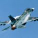 A Japanese F-2 fighter jet equipped with a large supersonic ASM-3 missile on the wing pylon.