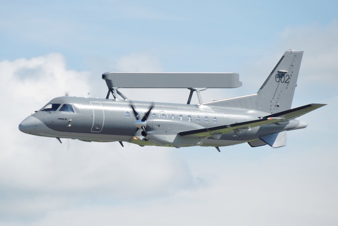 Saab 340 AEW&C (ASC 890) aircraft featuring the fixed rectangular Erieye AESA radar fairing on its fuselage.