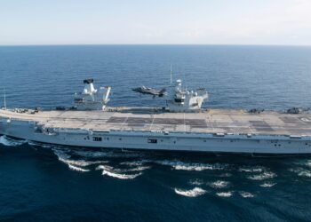 An image of HMS Prince of Wales and f35b lightining 2 taking off from it.