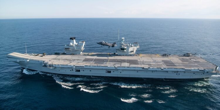 An image of HMS Prince of Wales and f35b lightining 2 taking off from it.