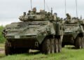 Canadian Army LAV VI armored vehicle operating during combat maneuvers.