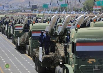 Houthi forces displaying mobile anti-ship and ballistic missile systems during a military parade in Sanaa.