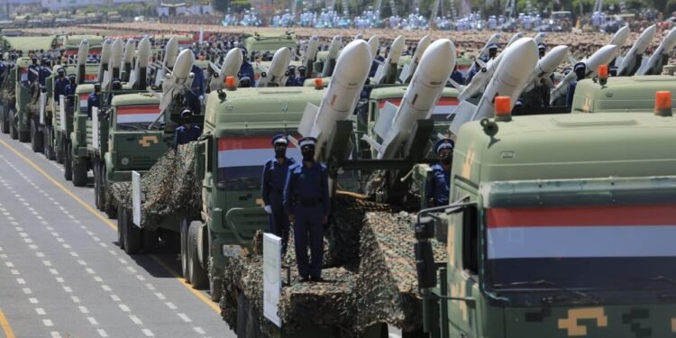 Houthi forces displaying mobile anti-ship and ballistic missile systems during a military parade in Sanaa.